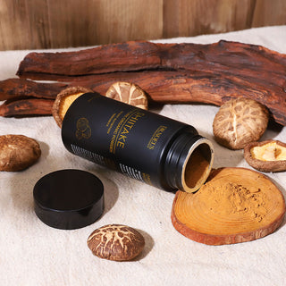 Container of Organic Shiitake Mushroom Powder with shiitake mushrooms beside it